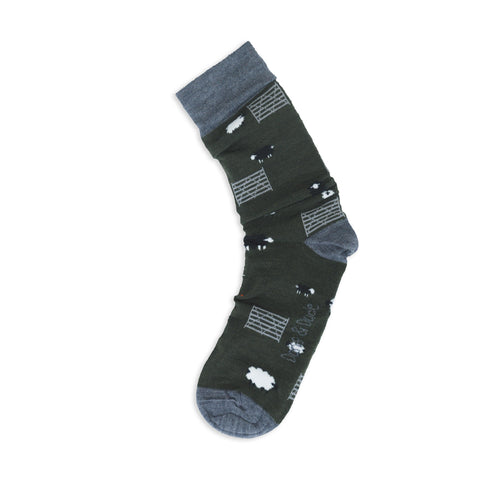 An image of a Dark Green Sheep calf length sock by Doris & Dude