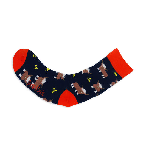 An image of a Navy Highland Cow calf length sock by Doris & Dude